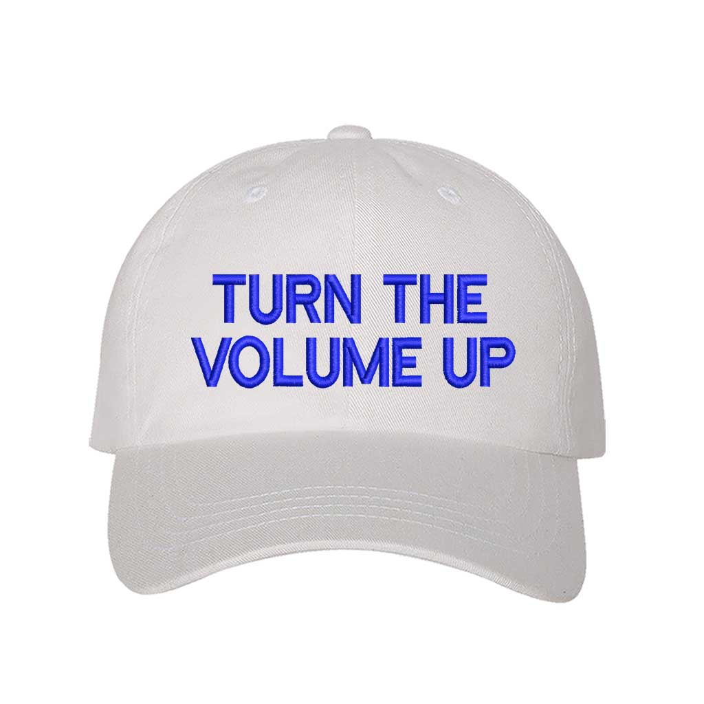 White with blue thread Turn Up The Volume Embroidered Baseball Hat featuring classic design, music-inspired embroidery, and adjustable hook and loop closure – DSY Lifestyle