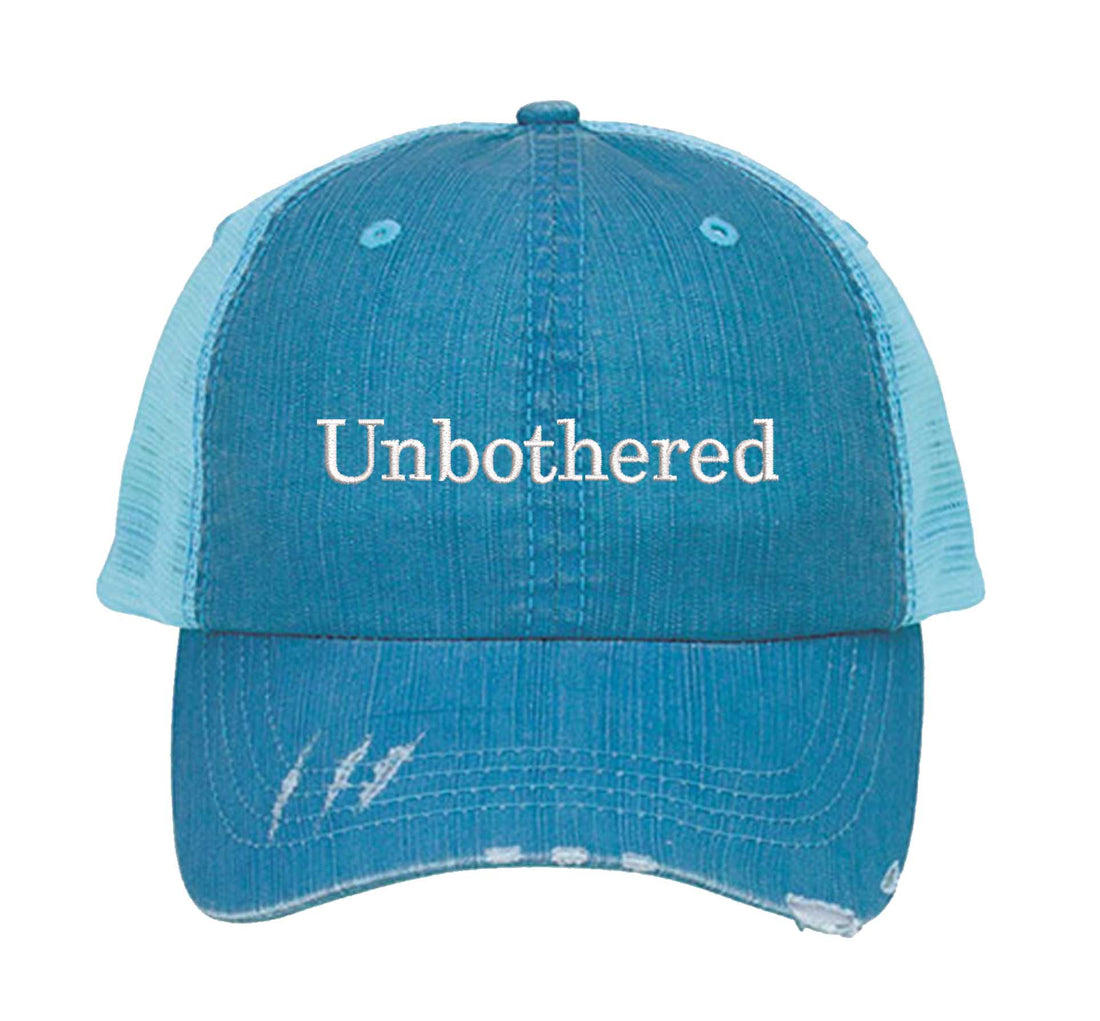 Aqua Unbothered Distressed Trucker Hat. This premium vintage-style cap is the perfect gift for the unapologetically bold, featuring a breathable mesh back and custom embroidery. - DSY Lifestyle