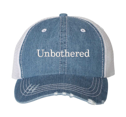 Denim Unbothered Distressed Trucker Hat. This premium vintage-style cap is the perfect gift for the unapologetically bold, featuring a breathable mesh back and custom embroidery. - DSY Lifestyle