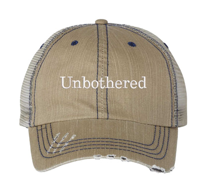 Khaki Unbothered Distressed Trucker Hat. This premium vintage-style cap is the perfect gift for the unapologetically bold, featuring a breathable mesh back and custom embroidery. - DSY Lifestyle