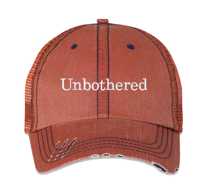 Orange Unbothered Distressed Trucker Hat. This premium vintage-style cap is the perfect gift for the unapologetically bold, featuring a breathable mesh back and custom embroidery. - DSY Lifestyle