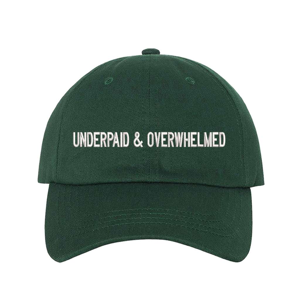 Forest Green baseball hat with the phrase underpaid &amp; overwhelmed embroidered on it-DSY Lifestyle
