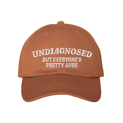 Texas Orange Undiagnosed But Everyone Is Pretty Sure embroidered baseball hat with bold stitching and relatable humor – DSY Lifestyle