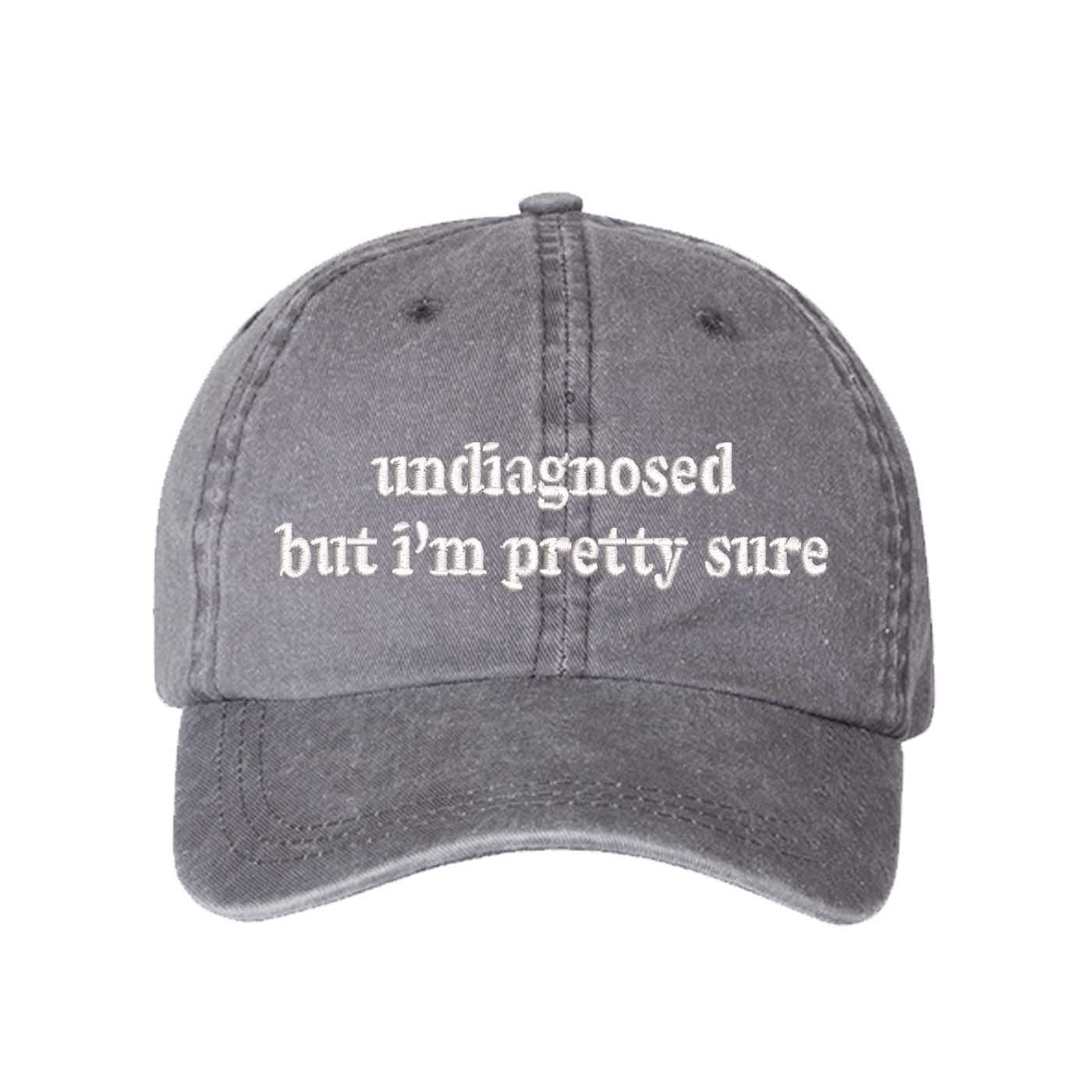 Gray Undiagnosed But I’m Pretty Sure washed cotton baseball hat with a soft finish and high-density white embroidery by DSY Lifestyle. - DSY Lifestyle