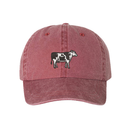 Wine Holstein Cow Washed Baseball Hat featuring a detailed black and white Holstein cow embroidered on a premium washed cotton crown; a heritage-inspired farm life piece by DSY Lifestyle.