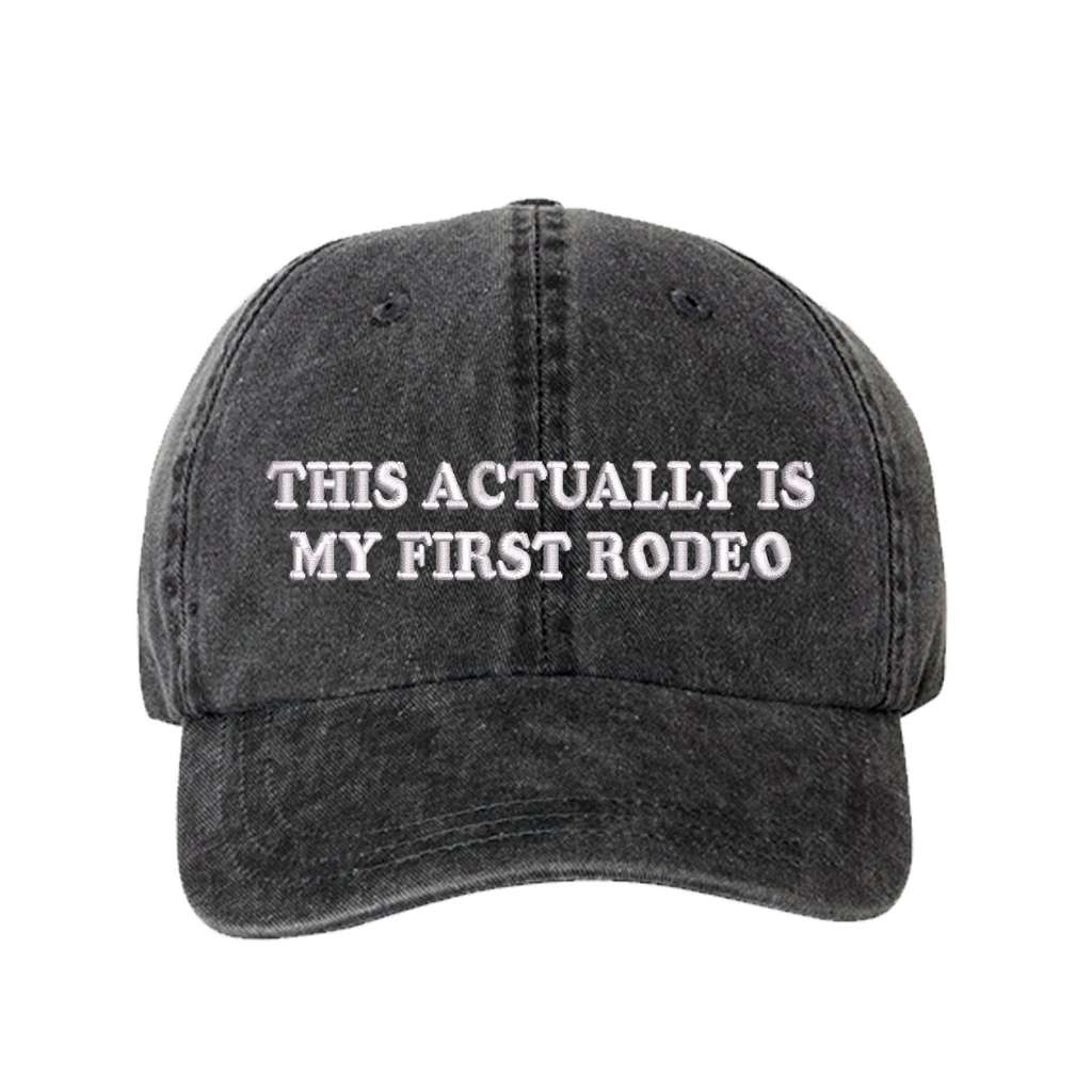 Washed black baseball hat with the phrase this actually is my first rodeo embroidered on it-DSY Lifesetyle