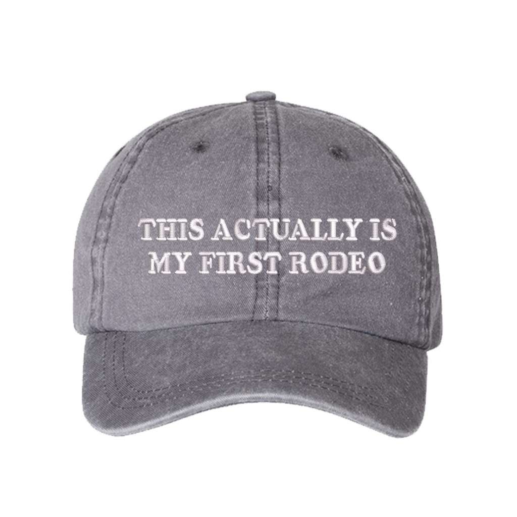 Washed grey baseball hat with the phrase this actually is my first rodeo embroidered on it-DSY Lifesetyle