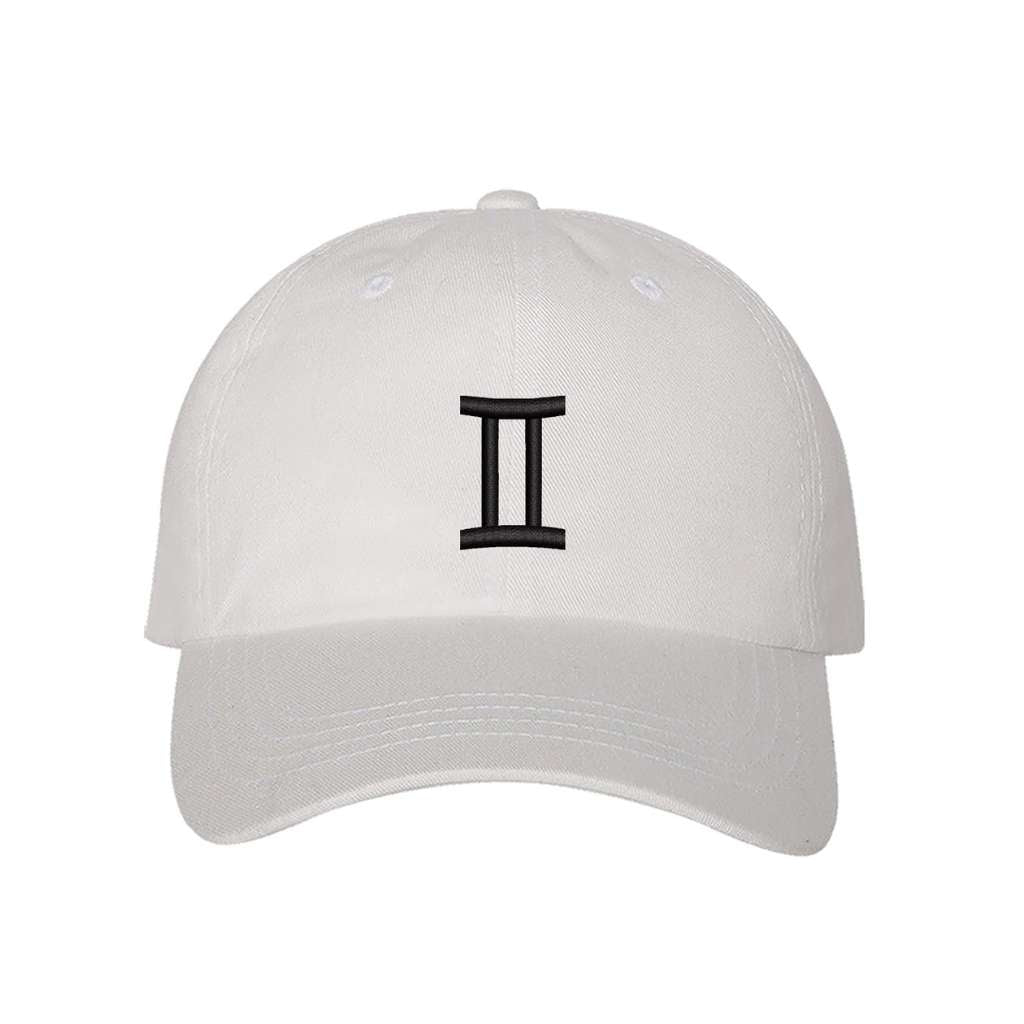 White baseball hat embroidered with a gemini sign on it- DSY Lifestyle