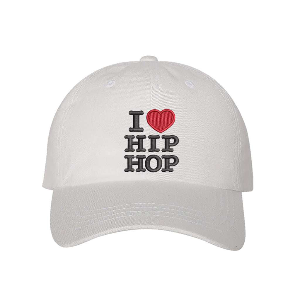 White baseball hat embroidered with the phrase i love hip hop but love is a heart- DSY Lifestyle