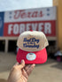 Bad Day To Be A Corndog embroidered hat in Natural with a red bill and royal blue lettering, held up at the fair