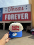 Bad Day To Be A Corndog embroidered hat in Natural with a royal blue bill and red lettering, held up at the fair