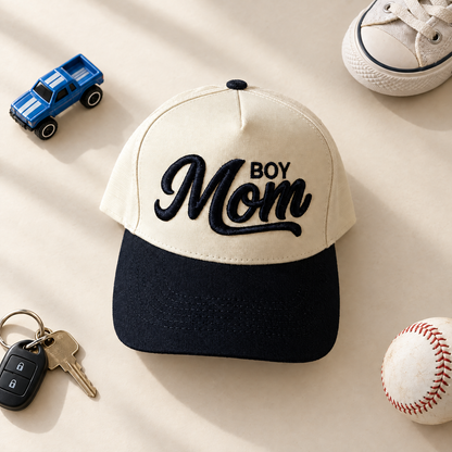 Boy Mom two-tone embroidered trucker hat styled flat lay