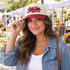 Model wearing the Girl Mom embroidered two-tone trucker hat