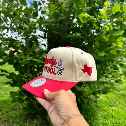 Howdy Futbol embroidered statement baseball hat in natural with red bill — DSY Lifestyle side view
