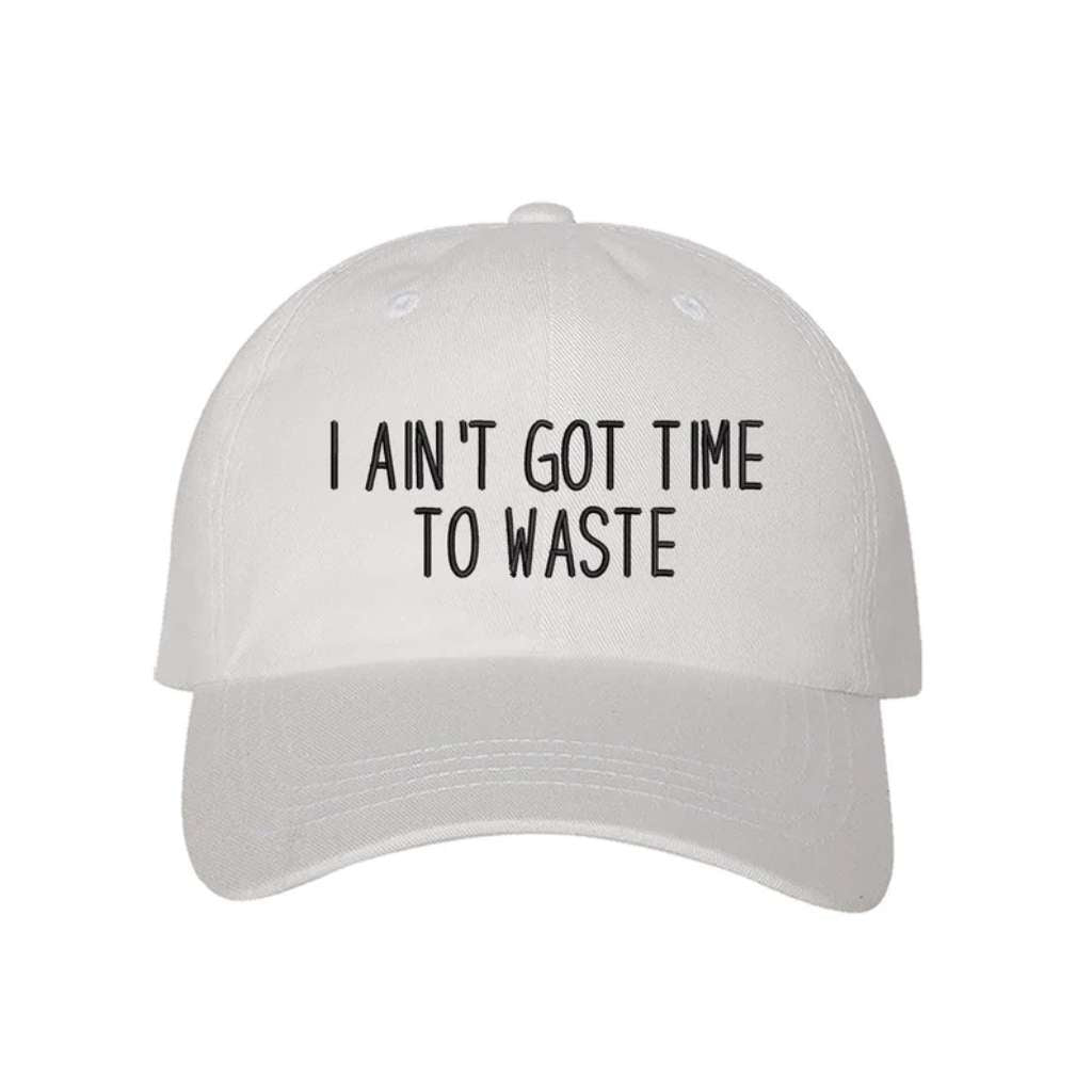 White baseball hat embroidered with the phrase I Ain&