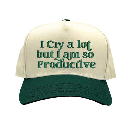 Natural Forest Green Two-tone embroidered baseball hat with “I Cry A Lot But I’m So Productive” stitched in bold lettering, styled on a casual outfit for emotional but driven energy. - DSY Lifestyle