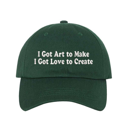 Forest Green baseball hat embroidered with the phrase I Got Art to Make I Got Love to Create - DSY Lifestyle