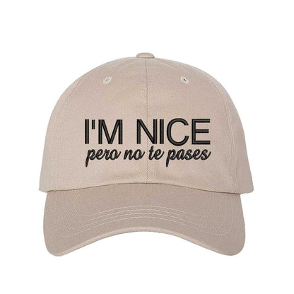 Stone I’m Nice Pero No Te Pases Embroidered Baseball Hat in soft cotton with curved brim and hook and loop closure. DSY Lifestyle.