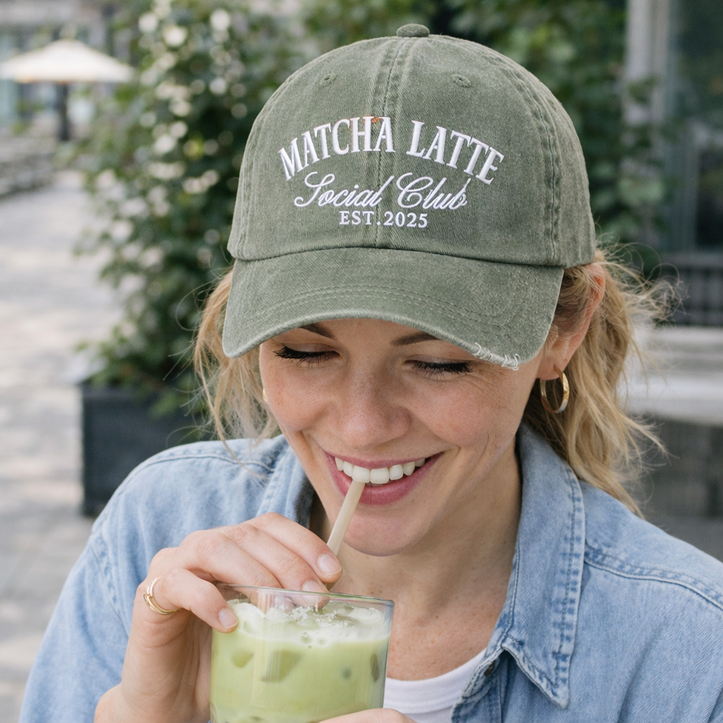 Female in suburbia drinking matcha wearing an Olive Matcha Latte Social Club Est. 2025 washed cotton baseball hat with premium green embroidery by DSY Lifestyle. - DSY Lifestyle