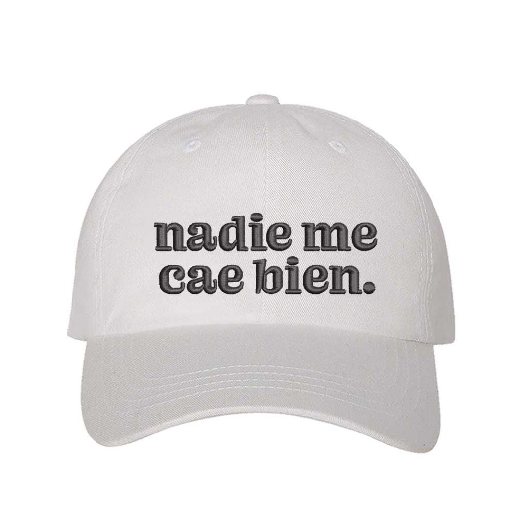 White Nadie Me Cae Bien embroidered baseball hat with adjustable hook &amp; loop closure, funny Spanish phrase cap for casual style and humor – DSY Lifestyle.