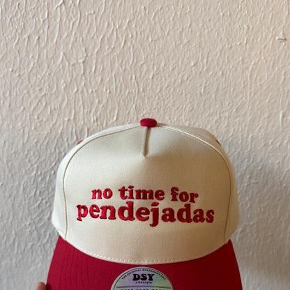 Close-up of No Time for Pendejadas machine embroidery on a two-tone trucker hat