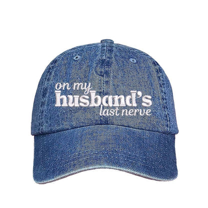 Light Denim On My Husband’s Last Nerve Embroidered Baseball Hat in cotton with curved brim and adjustable strap closure. DSY Lifestyle.