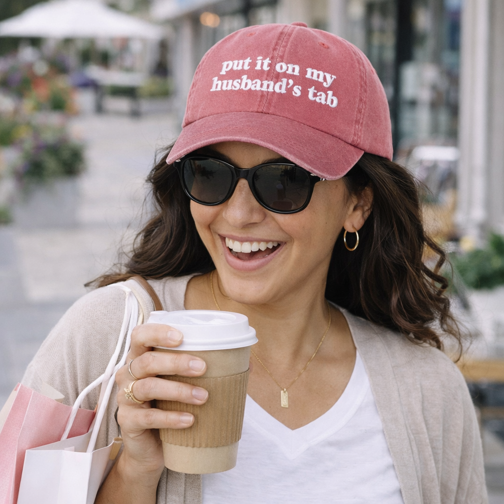 Female in suburbs wearing a Wine Put It On My Husband’s Tab washed cotton baseball hat with a soft finish and high-density white embroidery by DSY Lifestyle. - DSY Lifestyle