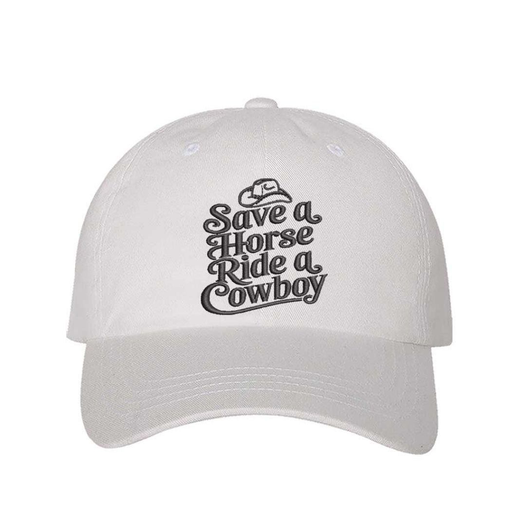 White embroidered baseball hat reading “Save a Horse, Ride a Cowboy” — flirty western aesthetic for bold country girls. - DSY Lifestyle