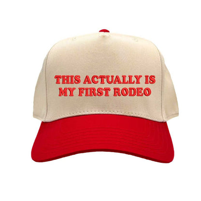 Natural Red embroidered hat that reads “This Actually Is My First Rodeo” in bold lettering; adjustable strap and curved bill; trendy unstructured cap for moms - DSY Lifestyle