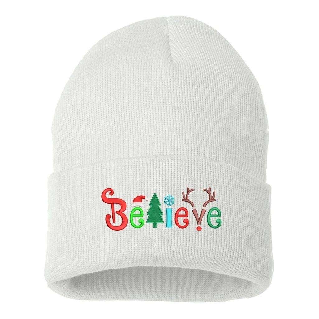 White cuffed beanie with Believe embroidered with Christmas symbols - DSY Lifestyle