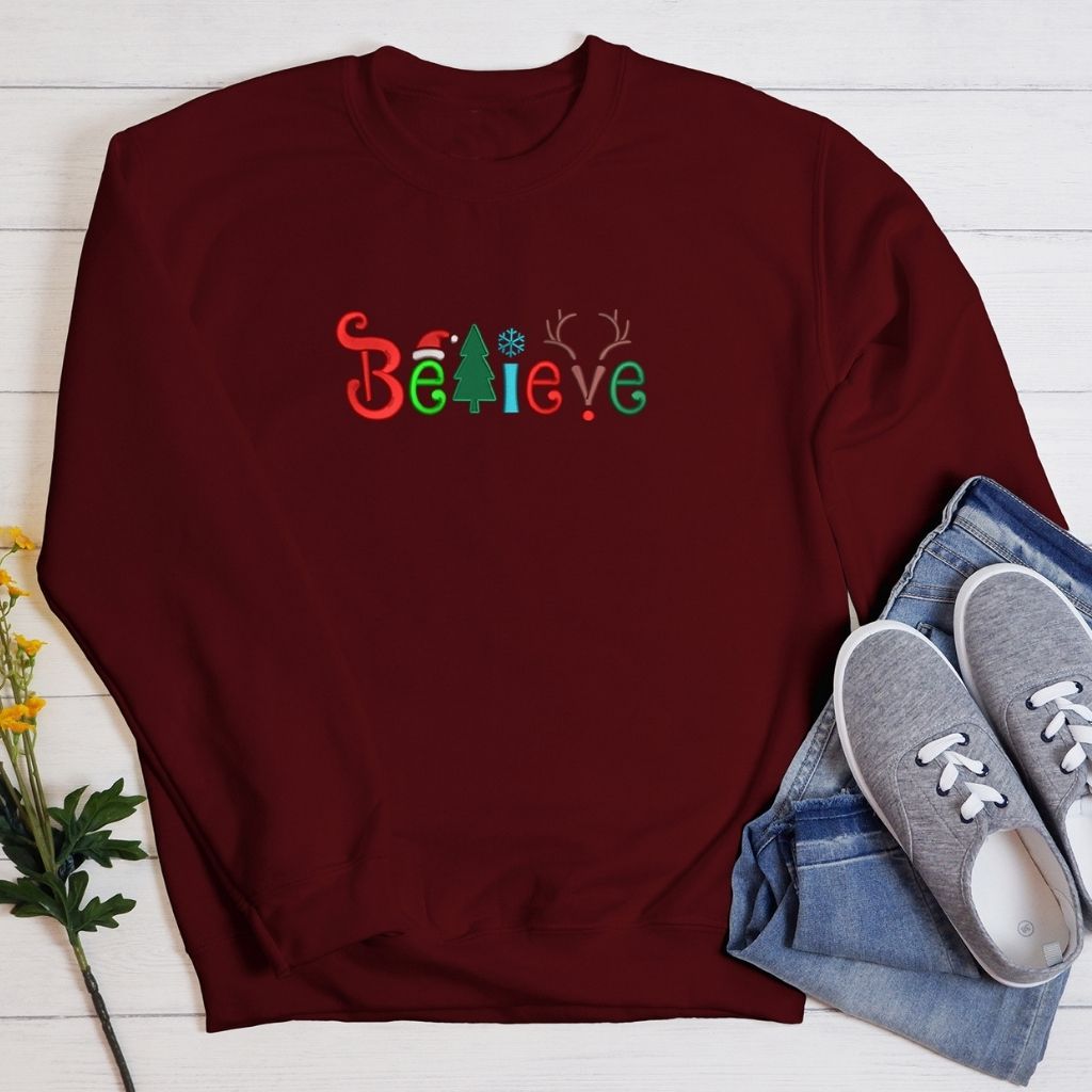Burgundy sweatshirt embroidered with Believe in the front -DSY Lifestyle