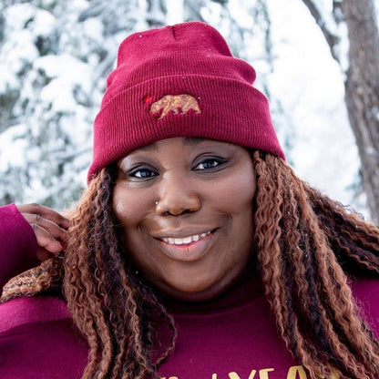 Model wearing burgundy cuffed beanie with California bear embroidered in front - DSY Lifestyle