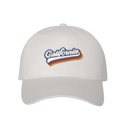 White baseball hat with California embroidered in white with a rainbow underline - DSY Lifestyle