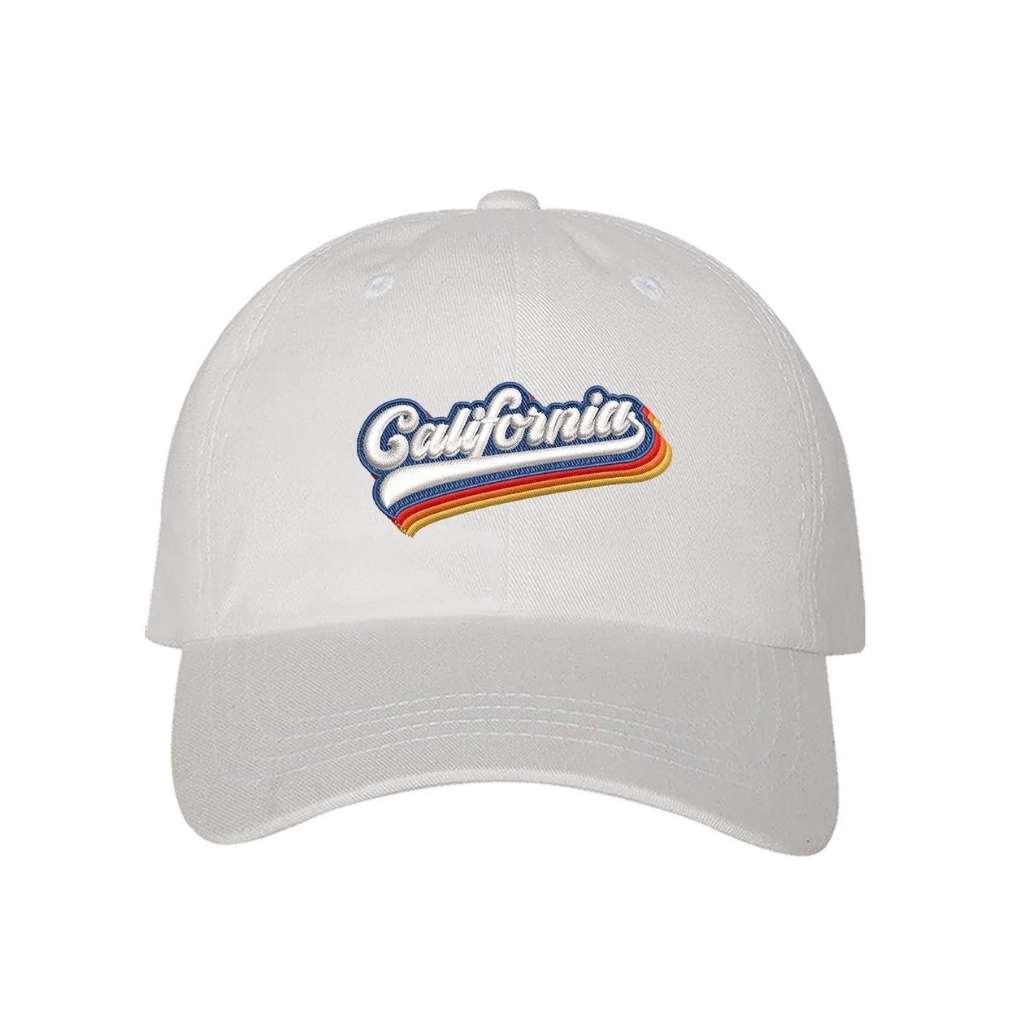 White baseball hat with California embroidered in white with a rainbow underline - DSY Lifestyle