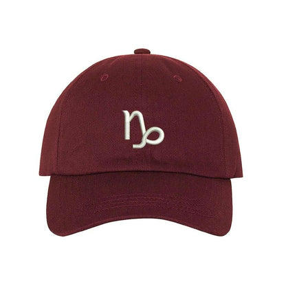 Burgundy baseball hat with Capricorn zodiac symbol embroidered in white - DSY Lifestyle 