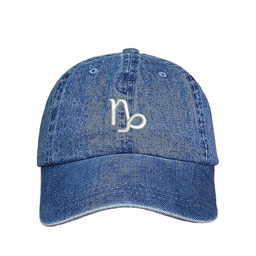 Light denim baseball hat with Capricorn zodiac symbol embroidered in white - DSY Lifestyle 