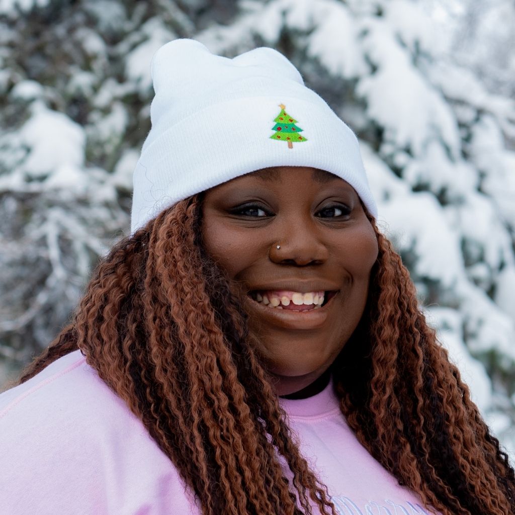 Female wearing a white beanie embroidered with a Christmas Tree - DSY Lifestyle