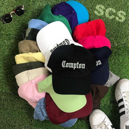 Group photo of baseball hat with Compton embroidered in white - DSY Lifestyle