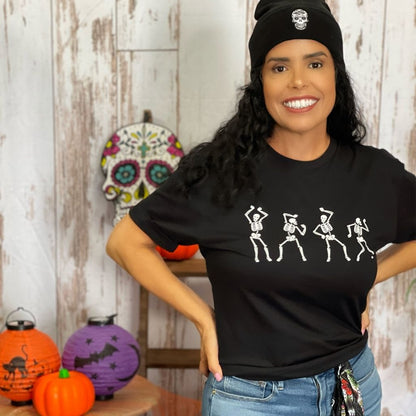 Female wearing a black unisex t-shirt with printed white dancing skeletons in the front - DSY Lifestyle