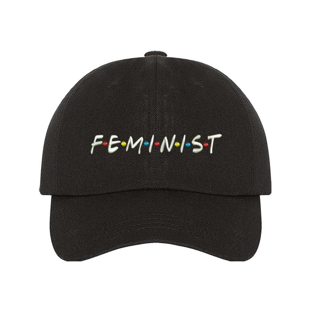 Black baseball hat with FEMINIST embroidered in white with multicolored dots in between letters - DSY Lifestyle