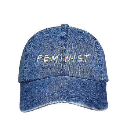 Light denim baseball hat with FEMINIST embroidered in white with multicolored dots in between letters - DSY Lifestyle