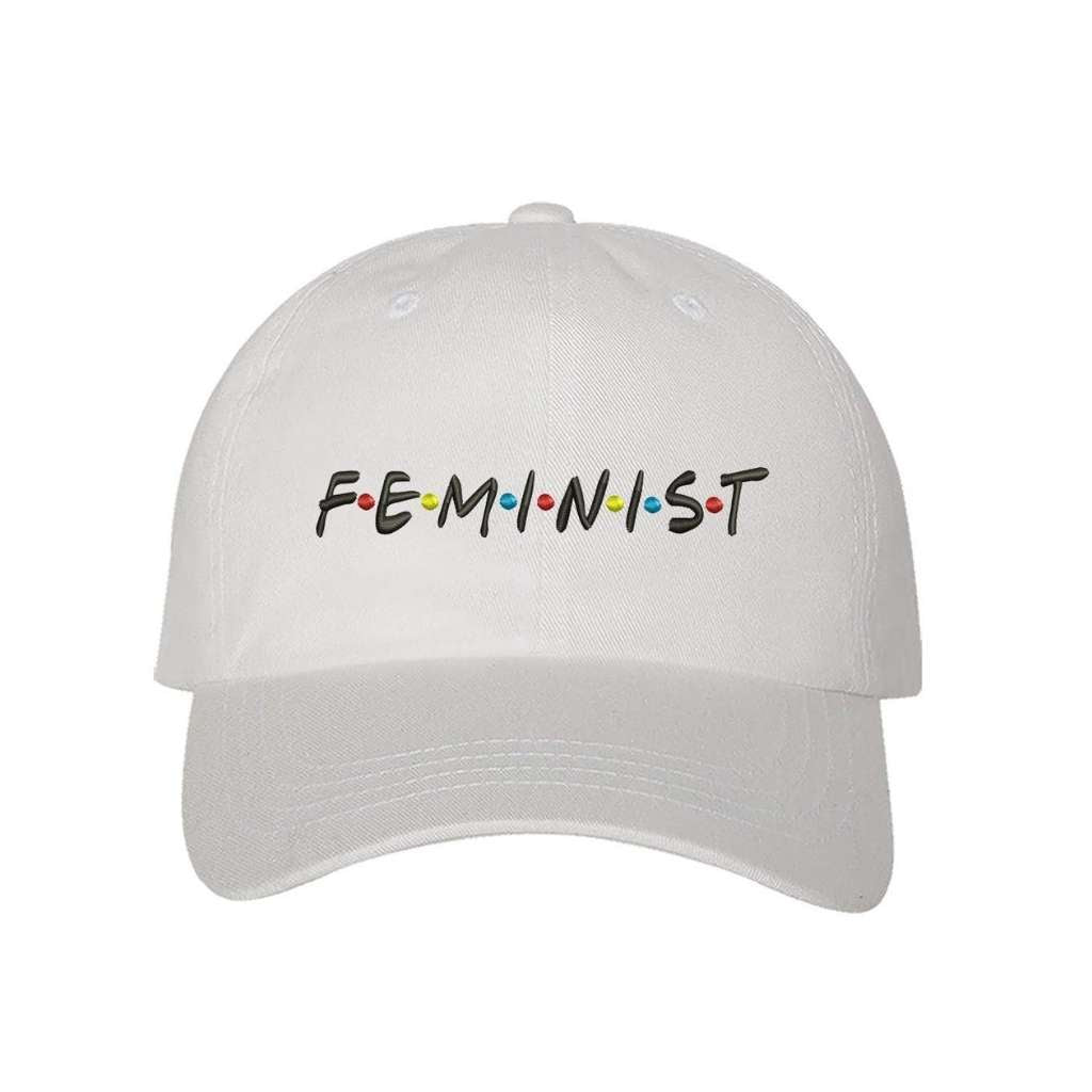 White baseball hat with FEMINIST embroidered in black with multicolored dots in between letters - DSY Lifestyle