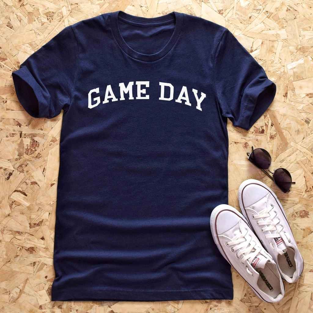 Flat Lay of a Navy  t-shirt printed with Game Day in white - DSY Lifestyle