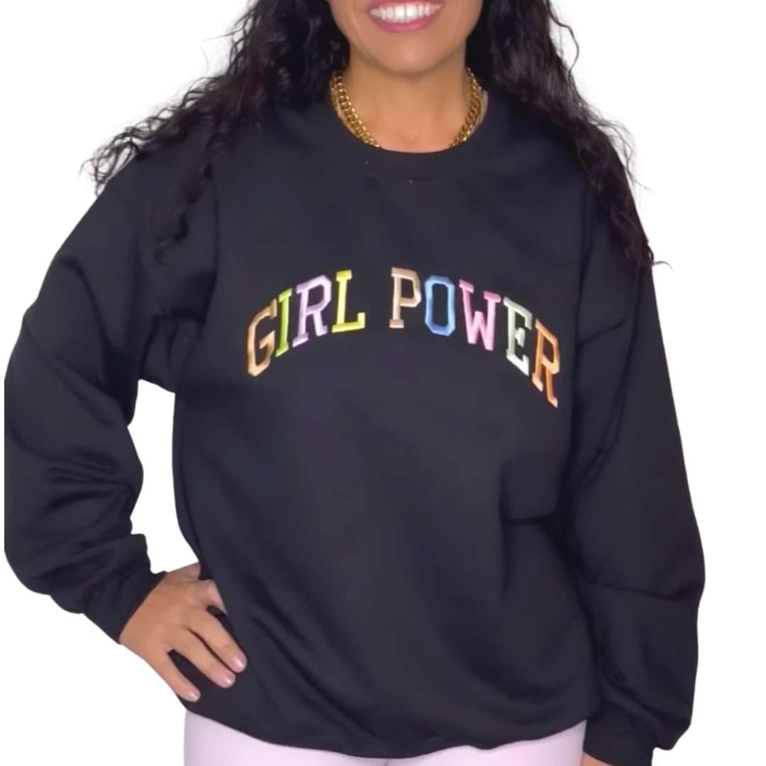 Female wearing a black sweatshirt embroidered with girl power in pastel colors - DSY Lifestyle