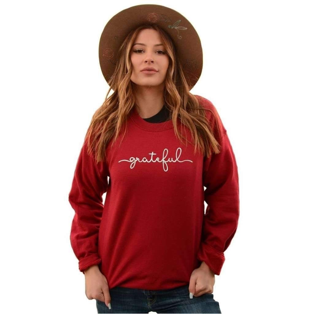 Female wearing a maroon sweatshirt embroidered with grateful - DSY Lifestyle