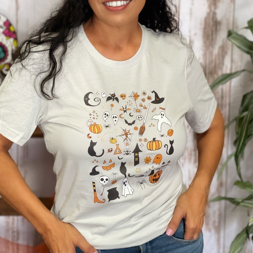 Female wearing an oversized unisex t-shirt with halloween doodles in the front - DSY  Lifestyle