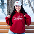 Female wearing a burgundy hoodie with sweater weather embroidered in the front - DSY Lifestyle