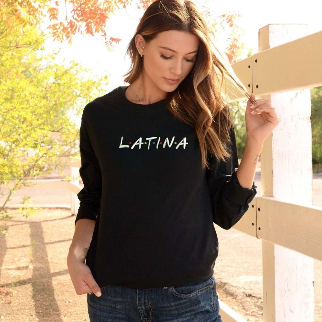 Female wearing a black sweatshirt embroidered with Latina in the front - DSY Lifestyle