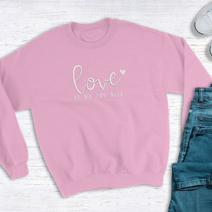Pink sweatshirt embroidered with Love is all you need in white - DSY Lifestyle