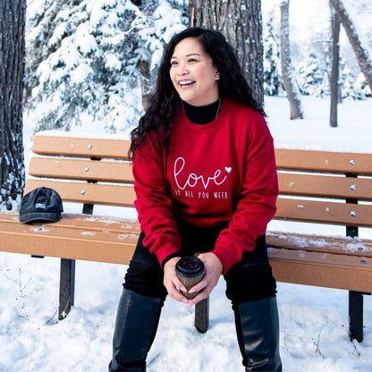 Red hoodie embroidered with Love is all you need in white - DSY Lifestyle